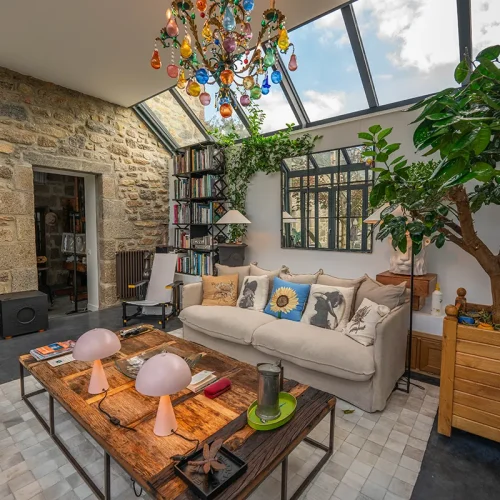 Extension orangerie aluminium avec cloison vitrée séparative